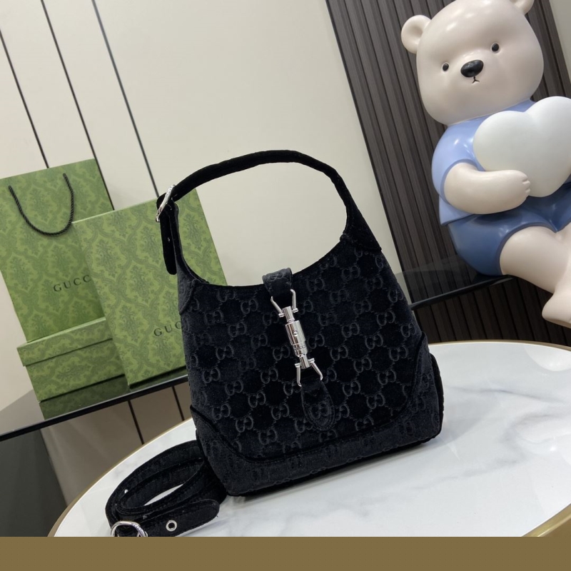 G*u*i top handle bags